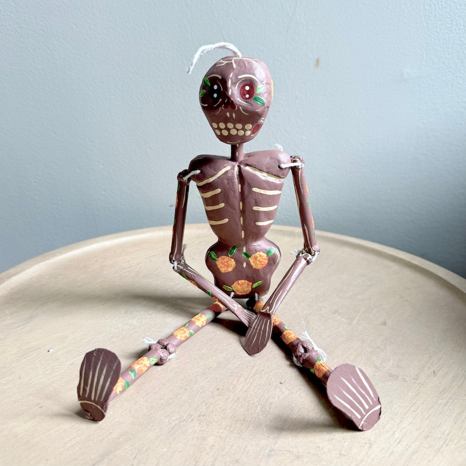 Light Brown Paper Mache Skeleton With Marigold