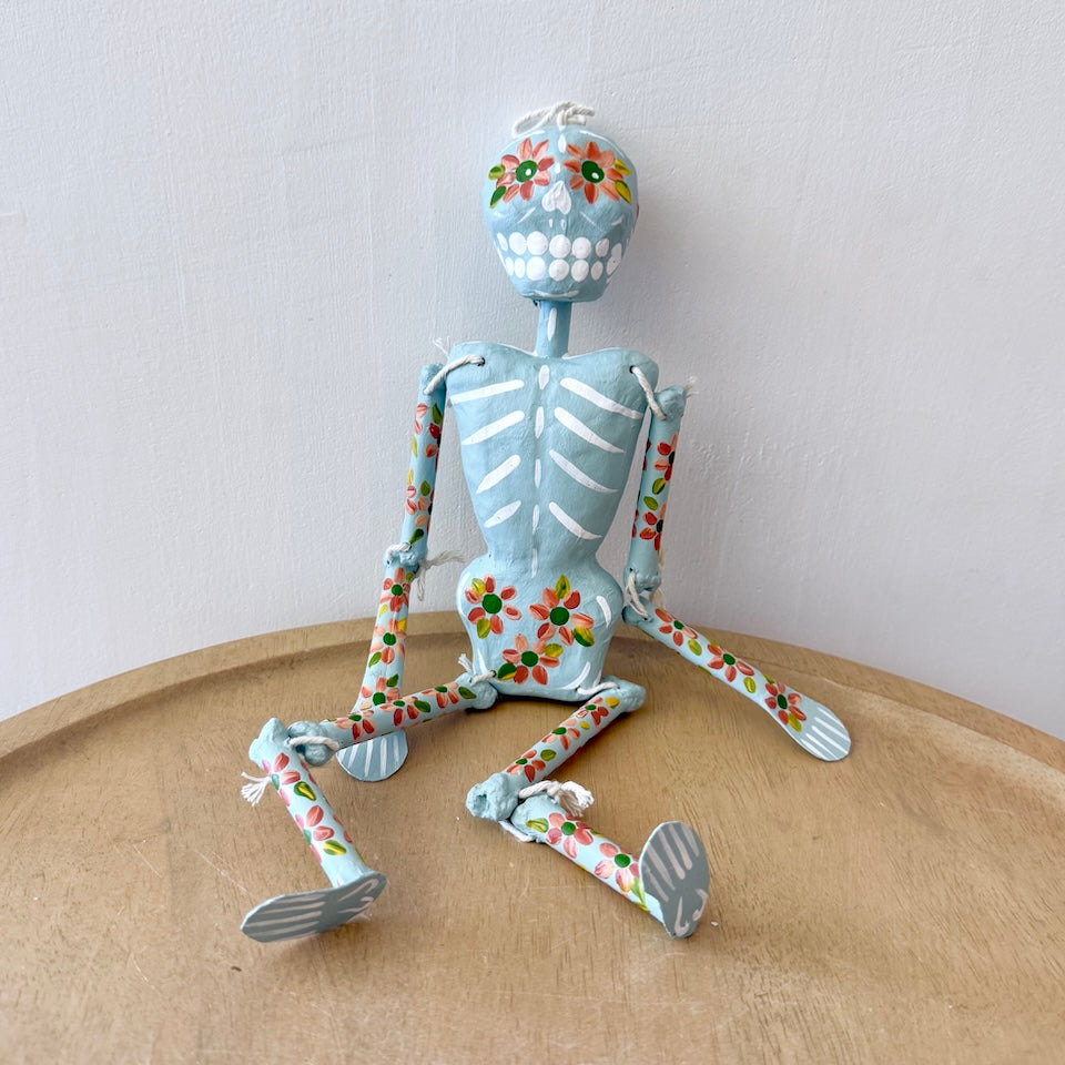 Light Blue Paper Mache Skeleton With Flowers