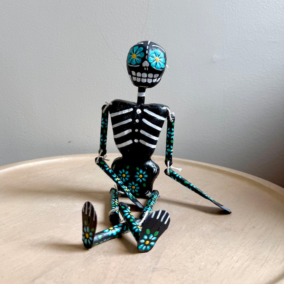 Black Paper Mache Skeleton with flowers
