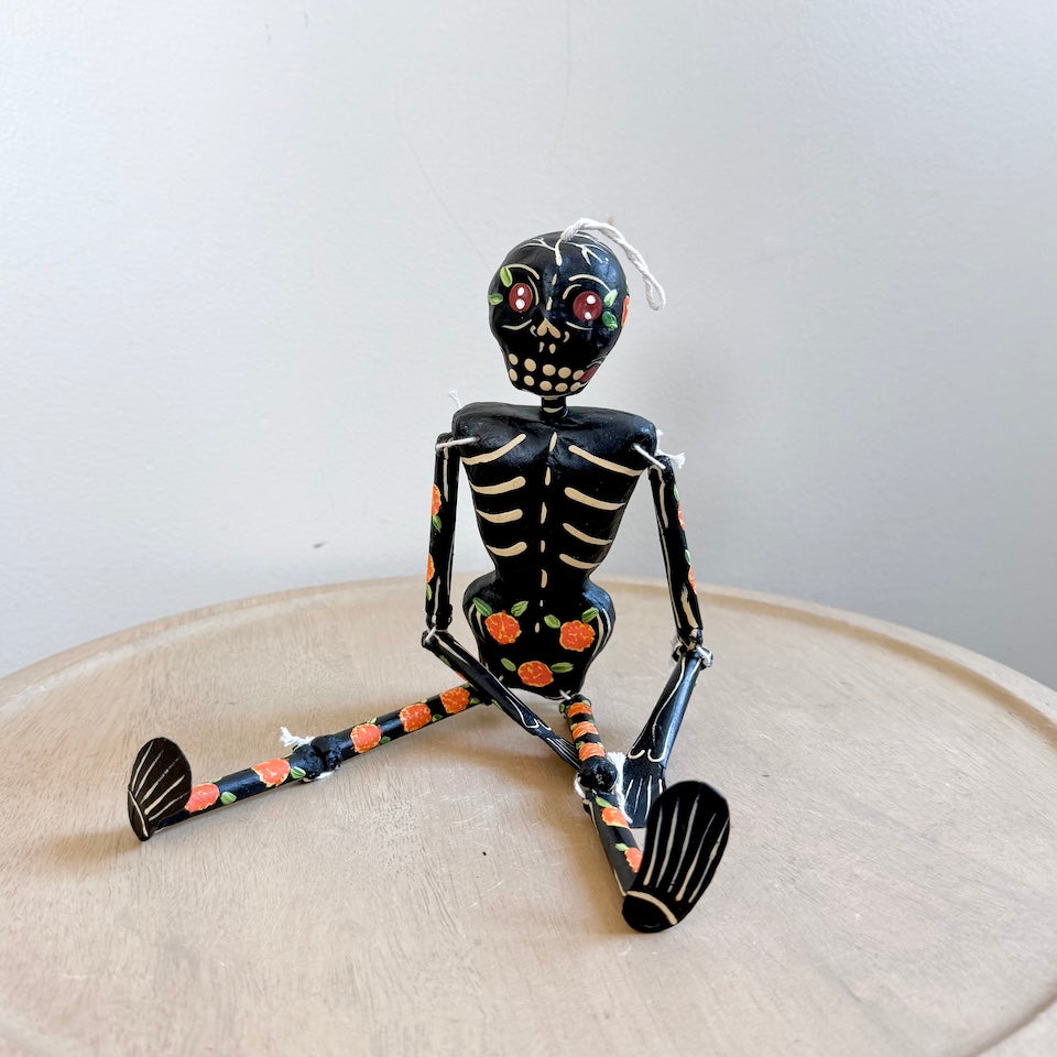 Black Paper Mache Skeleton With Marigold