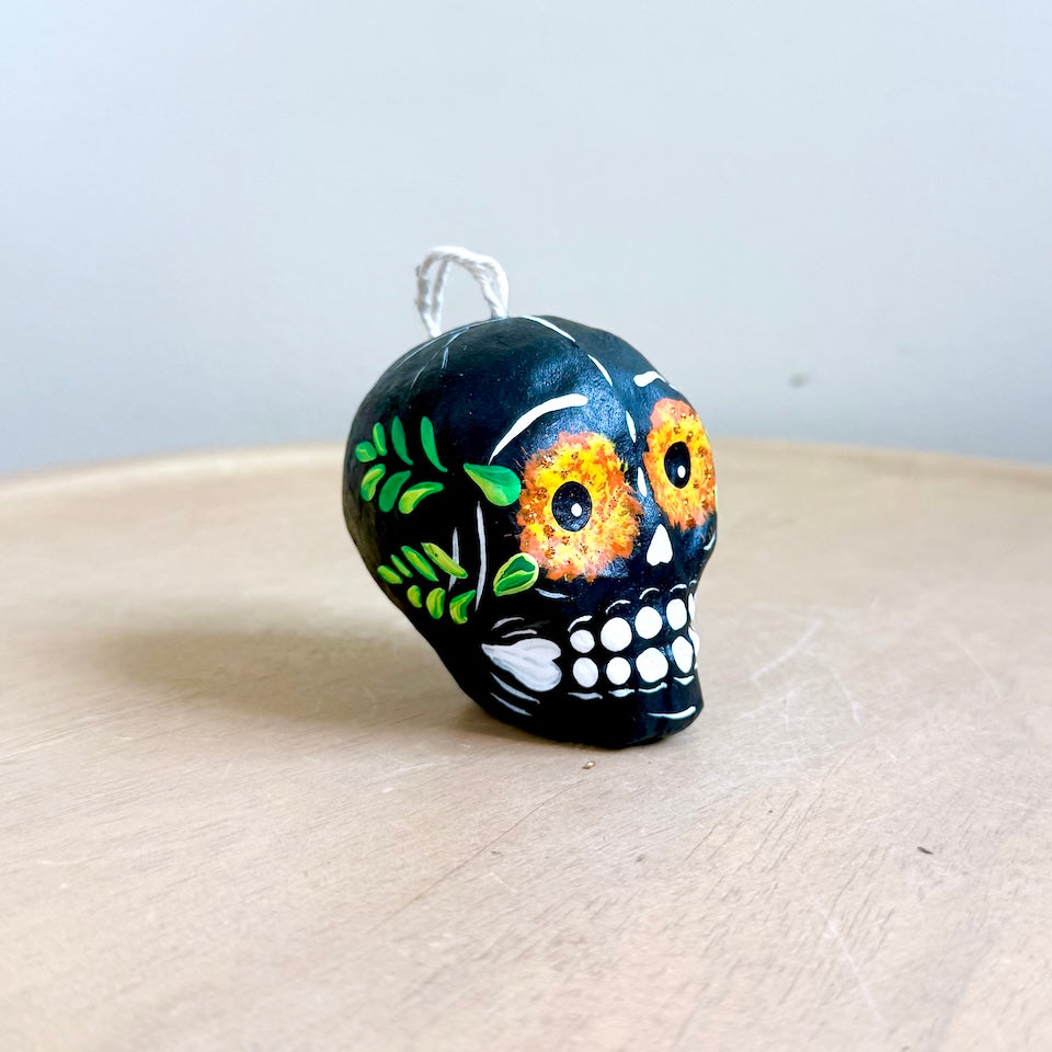 Small Paper Mache Skulls with Marigold Eyes