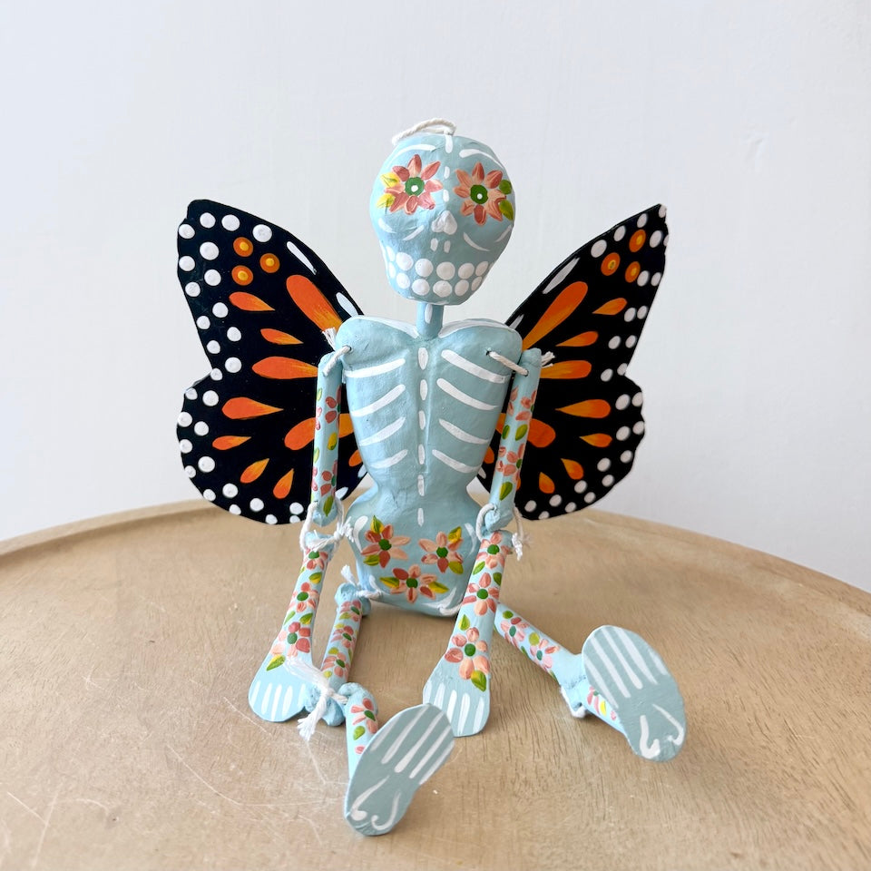 Light Blue Skeleton with Monarch Butterfly Wings
