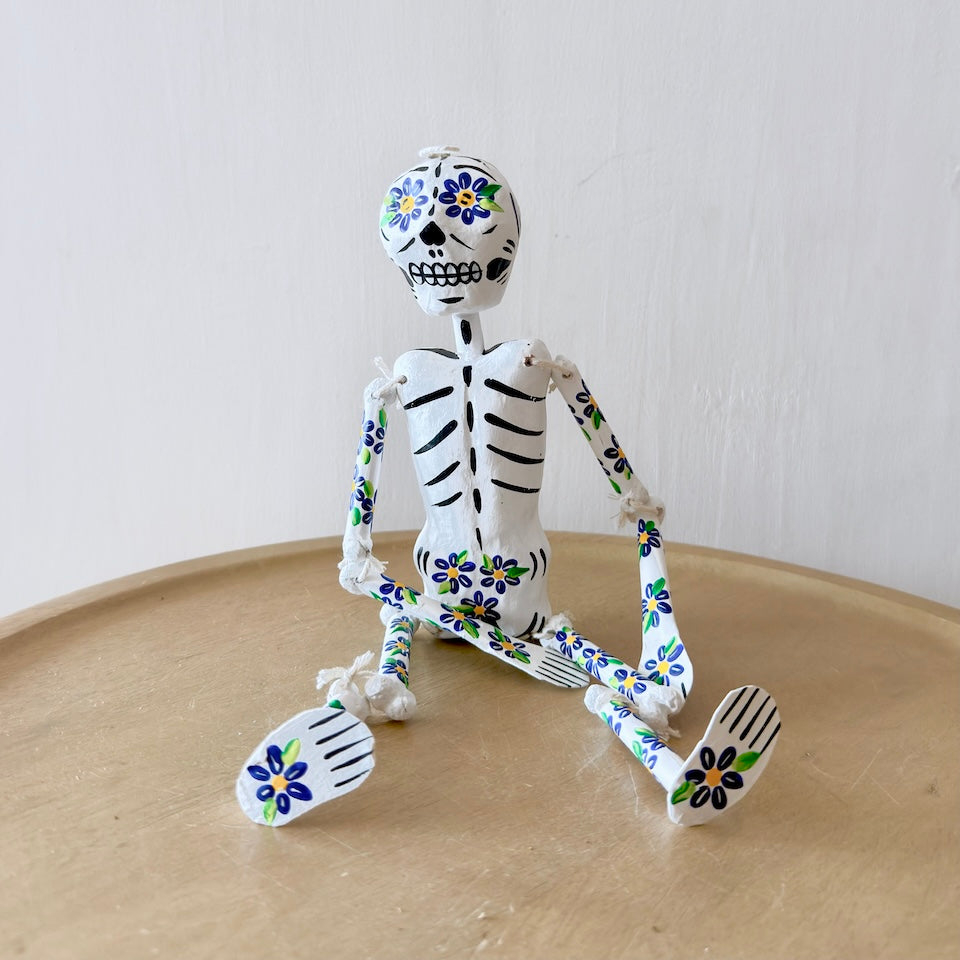 White Paper Mache Skeleton with Orange Flowers